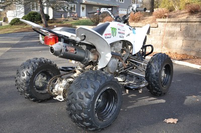 2010 Yamaha Raptor 250, white , excellent condition, push bar, nerfs, exhaust