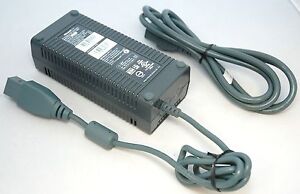 The massive AC-DC converter "power brick" of an X-Box 360 gaming console
