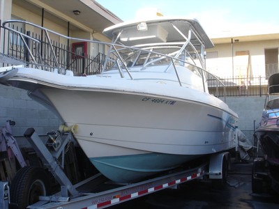 Proline 2610W/A Volvo duo prop Diesel and trailer