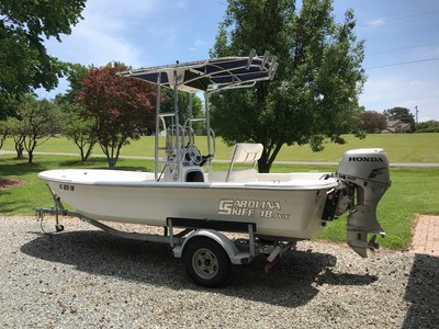 2009 Carolina Skiff 18 JVX, Honda 50HP, T Top, galvanized trailer