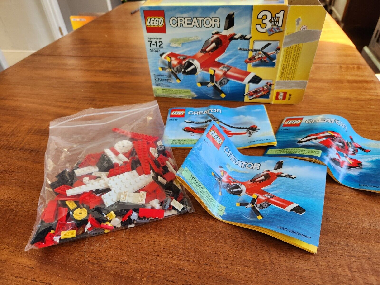 Lego Creator 31047 3-in-1 Propeller Plane.  100% complete with box and manuals