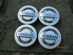 Nissan maxima center caps oem