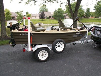 Sundolphin Pro 102 Boat, Motor, Trailer and Accessories