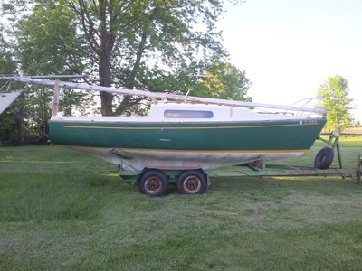 22' Morgan sailboat, cruiser, racer with sails, trailer, and outboard motor