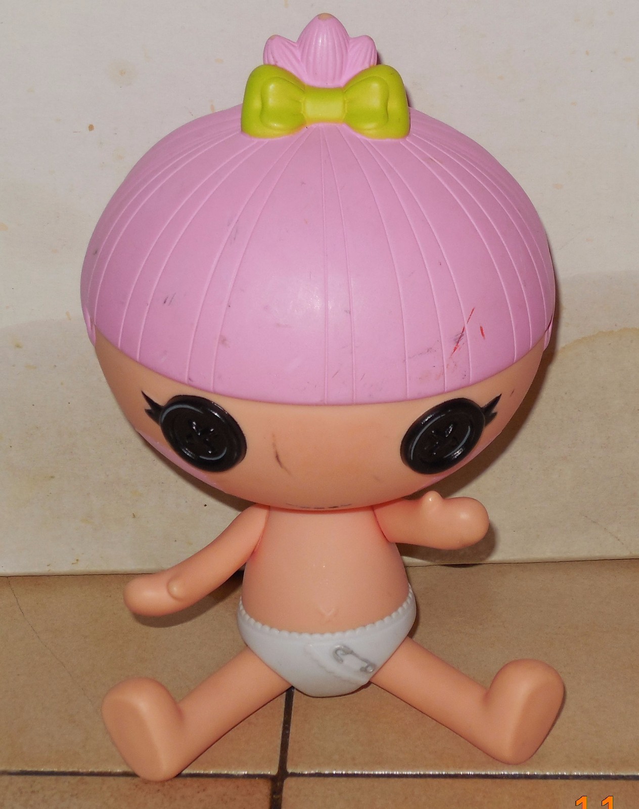 baby doll with pink hair
