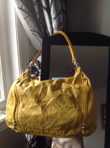 Details about Jessica Simpson handbag , mustard color