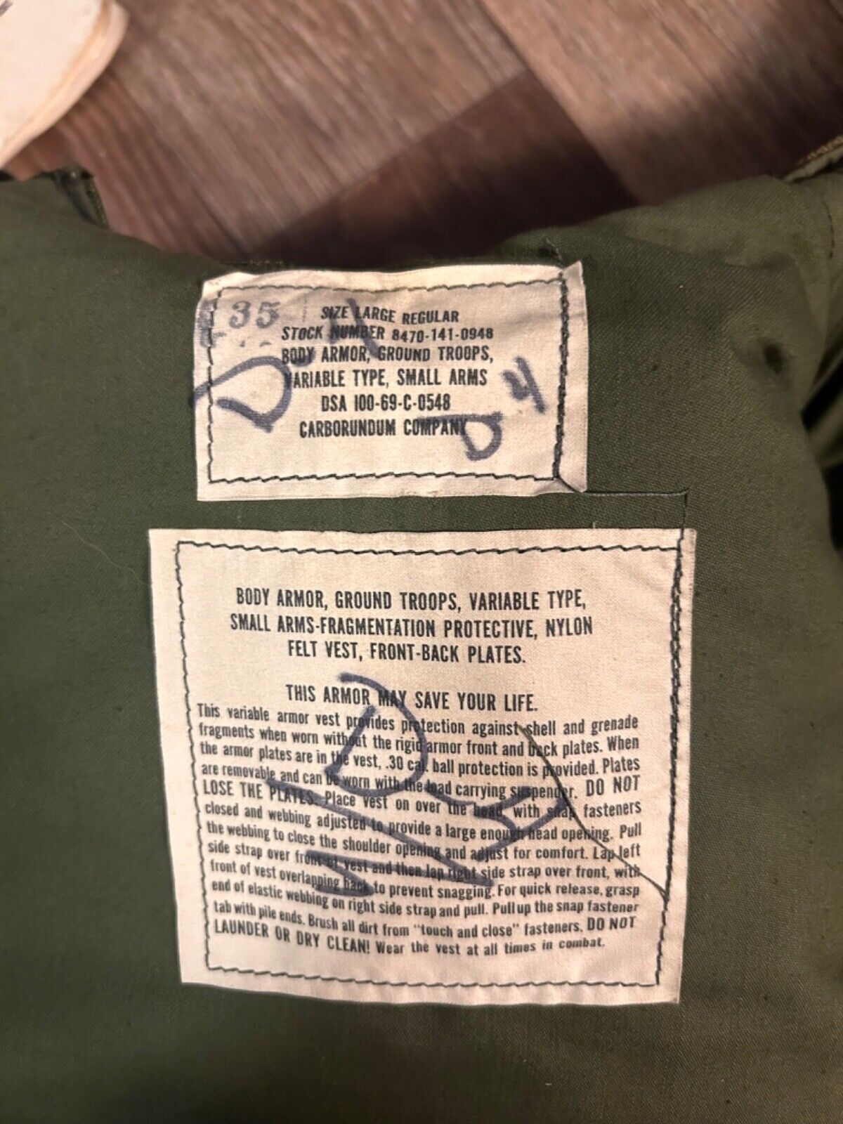 vietnam era variable body armor with plates UNISSUED manual still attached.