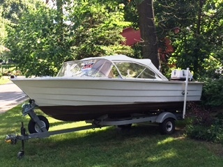 1967 Carver Sportsman16 wood lapstrake with 1967 Johnson33, trailer included.