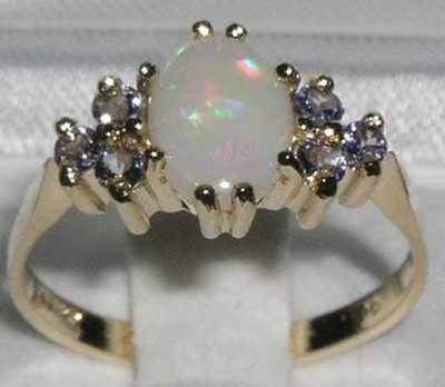 Pre-owned Gems Of America 10k Yellow Gold Natural Opal And Tanzanite Womens Classic Ring - Sizes 4 To 12 In Multicolor