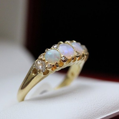 1920s Antique ring with Fiery Opal and beautiful old cut Diamonds set in 18ct go