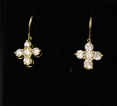 AB-FAB Diamond earrings in 18ct gold in a cross design, these Diamonds are reall