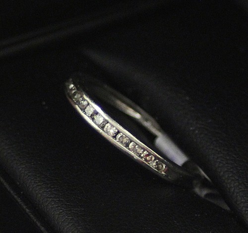 A platinum Vintage diamond eternity ring with 12 diamonds channel set