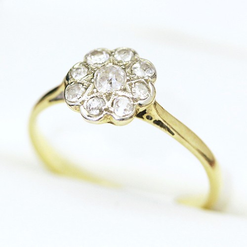 Antique 9 stone Diamond cluster engagement ring, with old mine cut diamonds