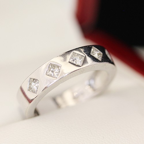 5 stone Diamond engagement ring, wedding band. With 5 diagonally set princess cu