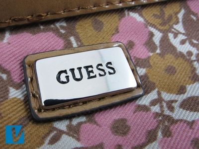 guess logo luggage