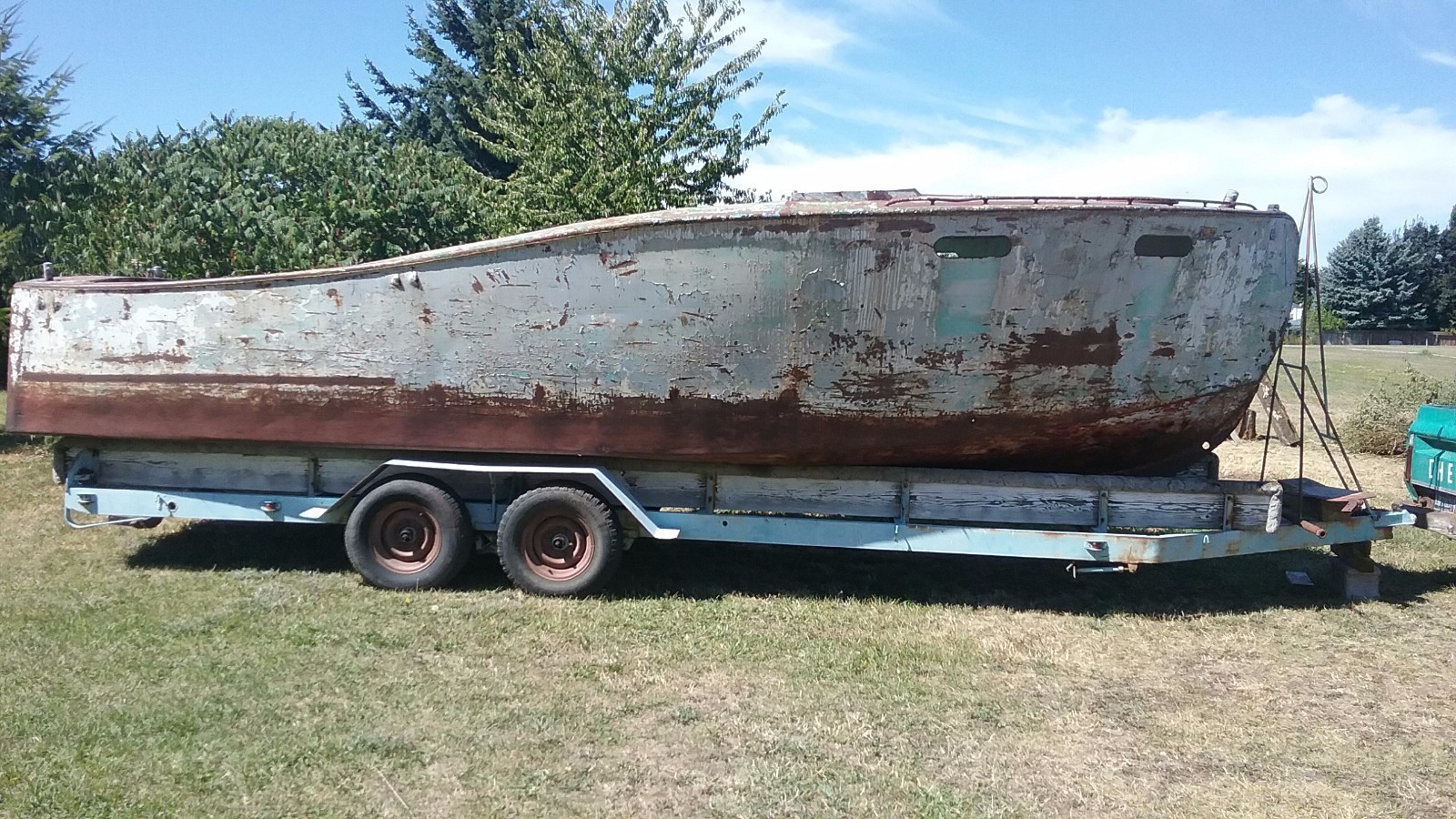 1940's Steelcraft boat, trailer, motor, transmission, controls, exhaust