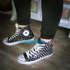 converse nere alte indossate