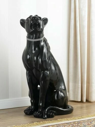 Statuette decorative neri per la casa