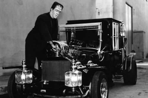 Fred Gwynne Tuning Up The Munster Car In The Munsters 11x17 Mini Poster