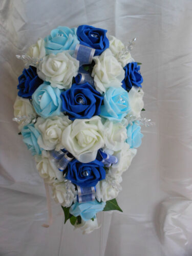 Brides,Bridesmaids,Flowergirl buttonholes  Royal//Light Blue//Ivory
