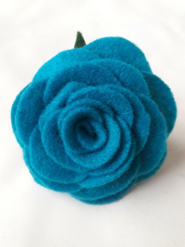 Felt flower brooch in teal