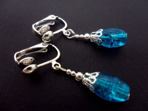 NEW. A PAIR OF PRETTY BLUE OVAL CRACKLE GLASS BEAD  CLIP ON EARRINGS