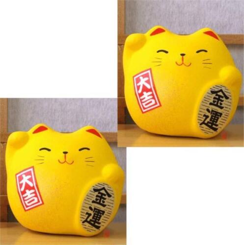Two Maneki Neko Feng Shui Lucky yellow cats for good fortune in finance 
