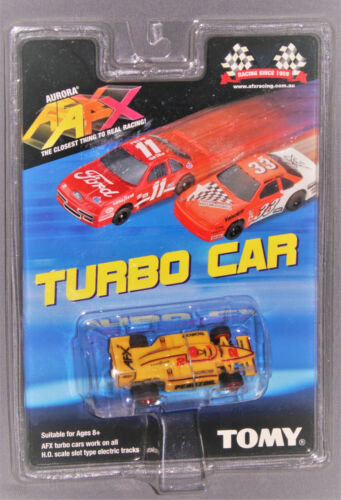 Formula Indy TOMY AFX #8799 AUS release #2 Turbo chassis w/red rims mib 