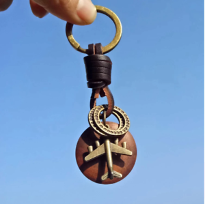Details about  / Vintage Handmade Leather Keychain Round Wood Bronze Airplane Pendant Key Ring