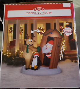 Christmas Santa in an Outhouse with Tipping Reindeer