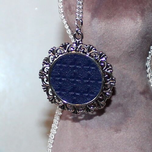 Long silver plate necklace with navy blue tone faux leather pendant 
