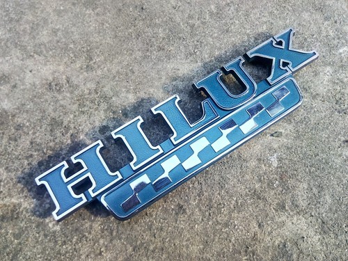 Toyota HILUX RN20 RN22 RN25 Pickup emblem badge Side NEW ORIGINAL STOCK 2X