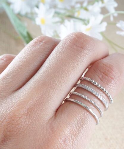 NUT fine stacking ring Sterling silver facetted.