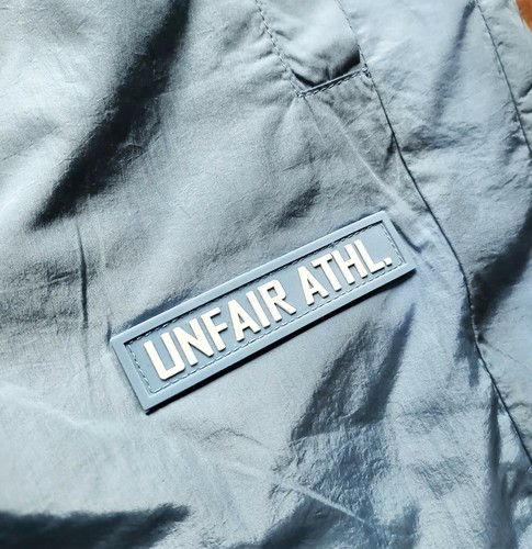Unfair Athletics Light Carbon Windrunner Hose Herren Blau Grau Jogger UNFR19060
