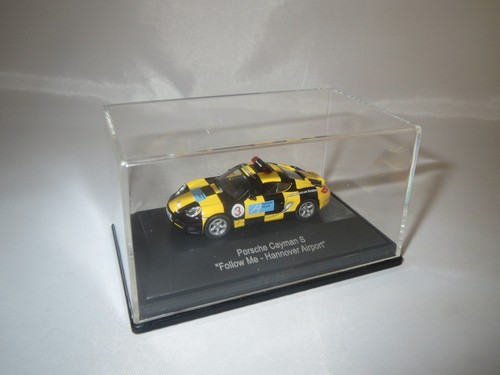 1:87 OVP ! schwarz//gelb Schuco 25386 Porsche Cayman S /"Follow Me/"