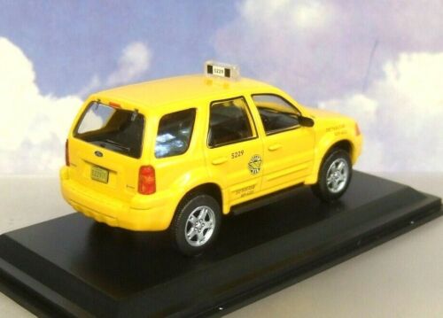 TAXIS OF THE WORLD DIECAST 1/43 FORD ESCAPE TAXI CAB CHICAGO USA 2005 IN YELLOW 