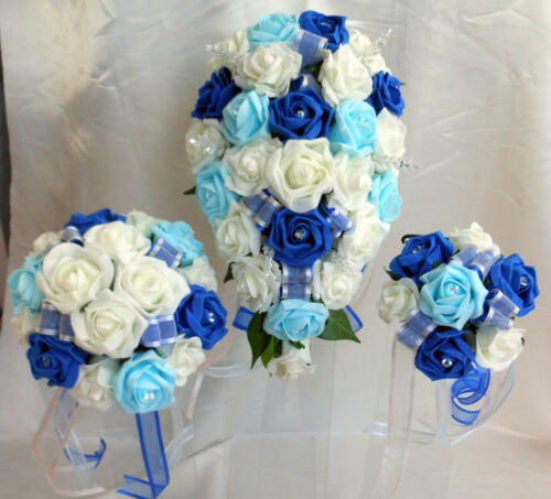 Brides,Bridesmaids,Flowergirl buttonholes  Royal//Light Blue//Ivory