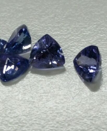 Each $30.00 Loose Gemstones tanzanite  6mm trillion aprox  0.70each stone 