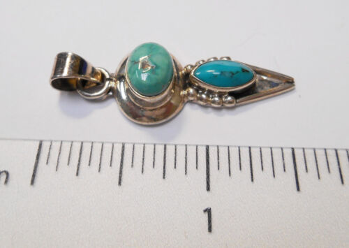 Sterling Pendant w/ Turquoise Stones