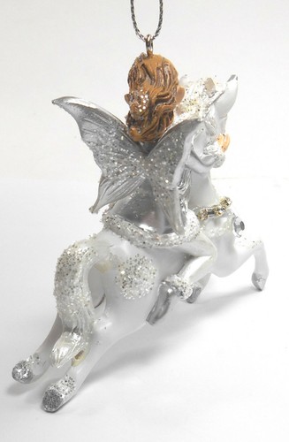 Elf on a Magical White Unicorn Christmas Ornament