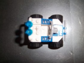 Lego 7279 City ATM Robbery with minifigures, ATV, dog, and manual