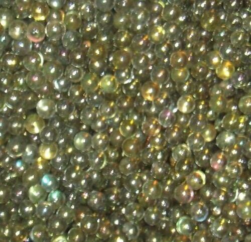 1pound of new yellow with a hint of silver cleary Champion marbles about 1/2 in 