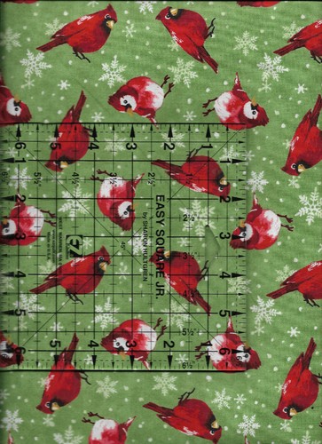 Christmas Cardinals with Snowflakes on Green 100/% cotton fabric by the half yard