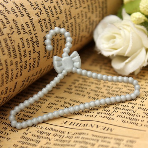 10Pcs Doll Clothes Bowknot Hanger Coat Dress Holder Children Plastic Mini Toy