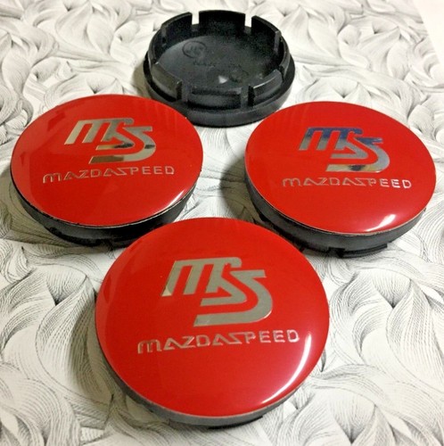 4x MAZDA velocità ruota centro CAP ROSSO//SILVER 56mm Set di 4 HUB CAP Decalcomania del logo 3D