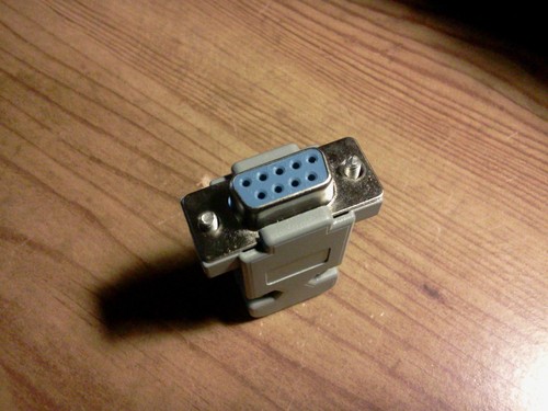 New 9 pin female solder D-sub connector with a plastic hood