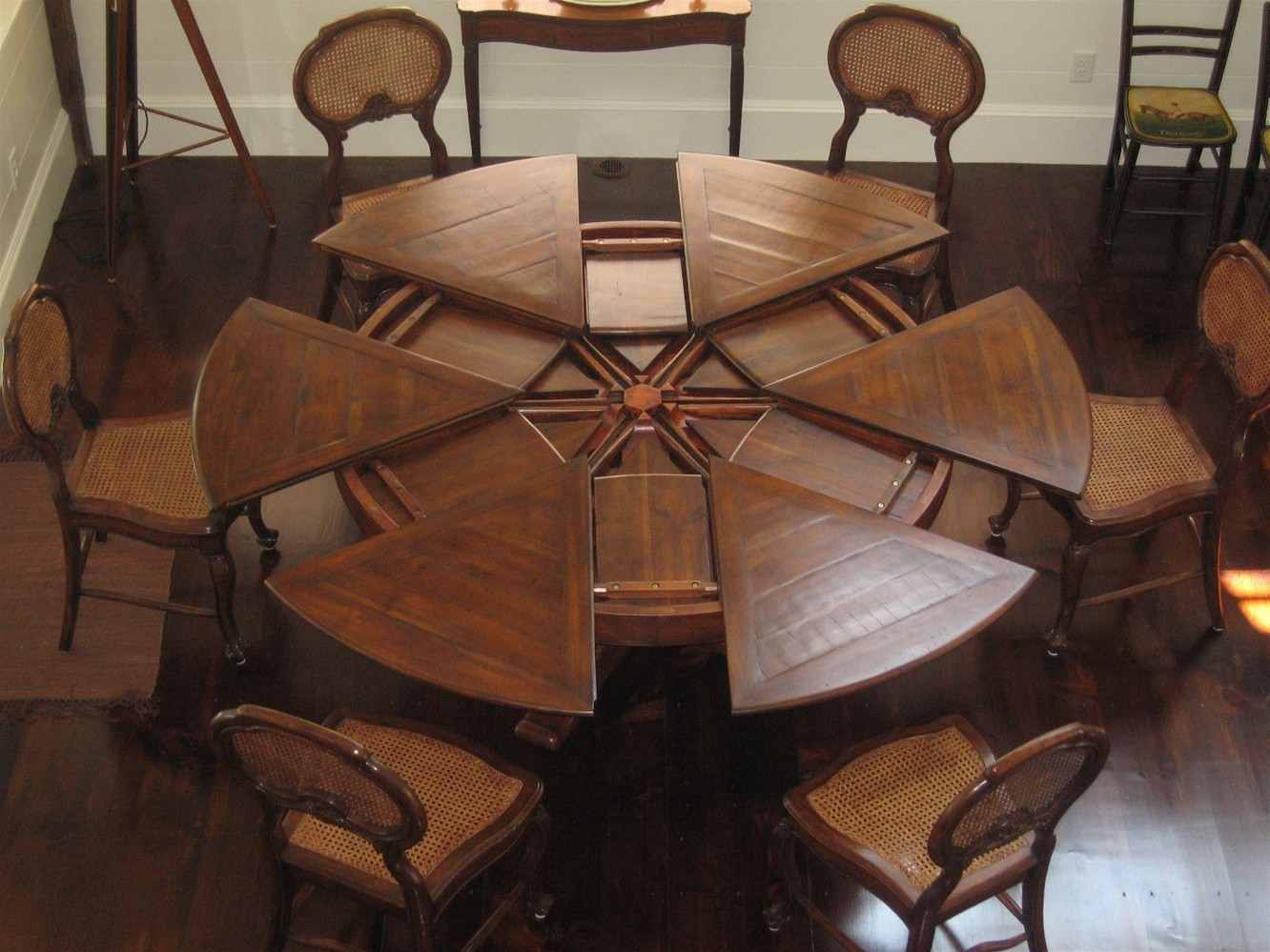 round expandable dining table solid walnut wood carved base finish