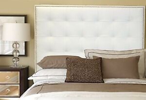 King Size White Leather Buttonless Tufted Headboard with Nail Heads Trim.