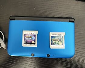 nintendo 3ds xl console with pokemon games