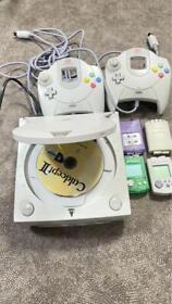SEGA Dreamcast HKT-3000 console with 4 game discs.